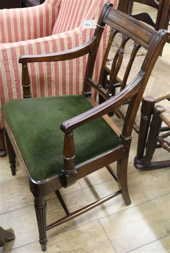 A Sheraton style mahogany elbow chair